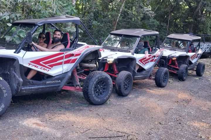 a car parked on a dirt road