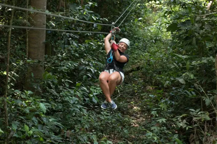 Woman ziplining in St. Lucia